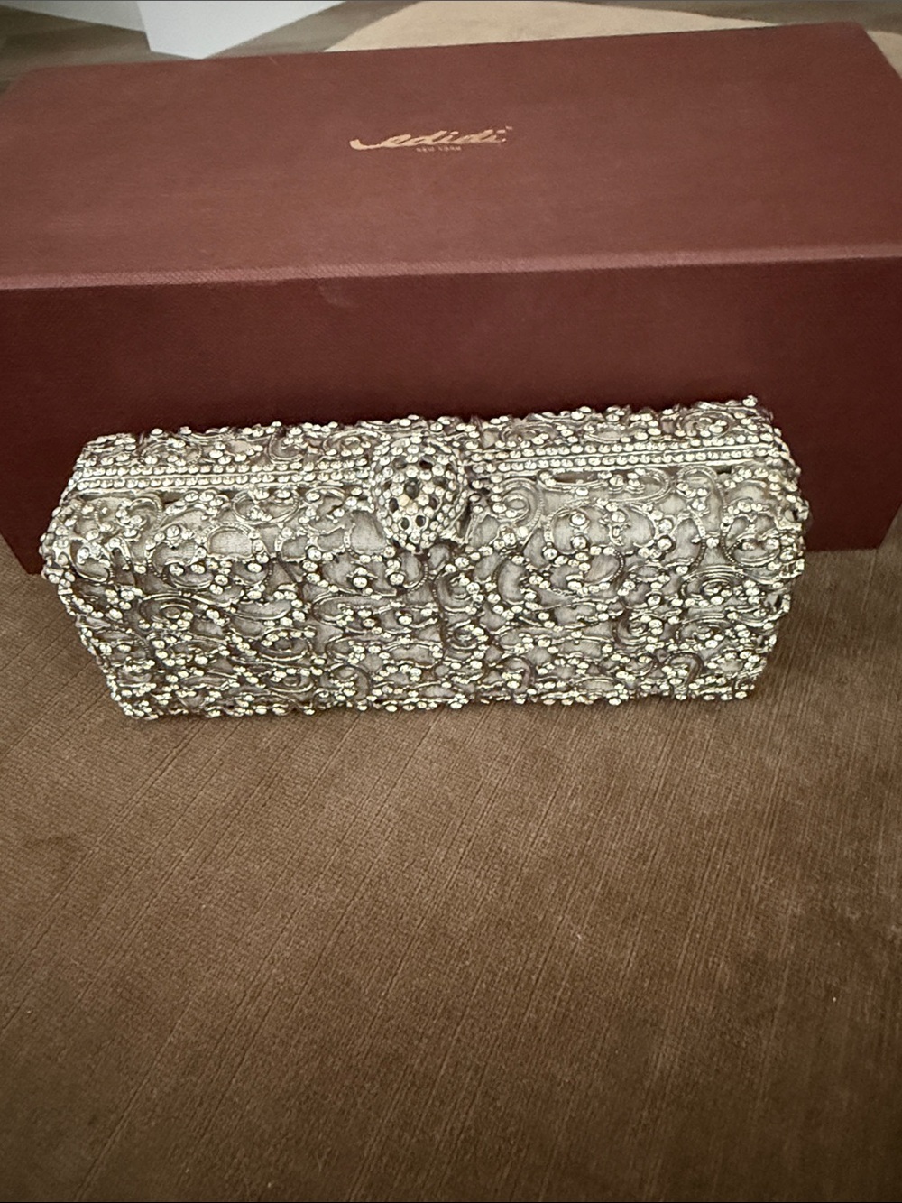 Gorgeous Edidi embellished Silver Evening Clutch with Ornate Crystal Detail